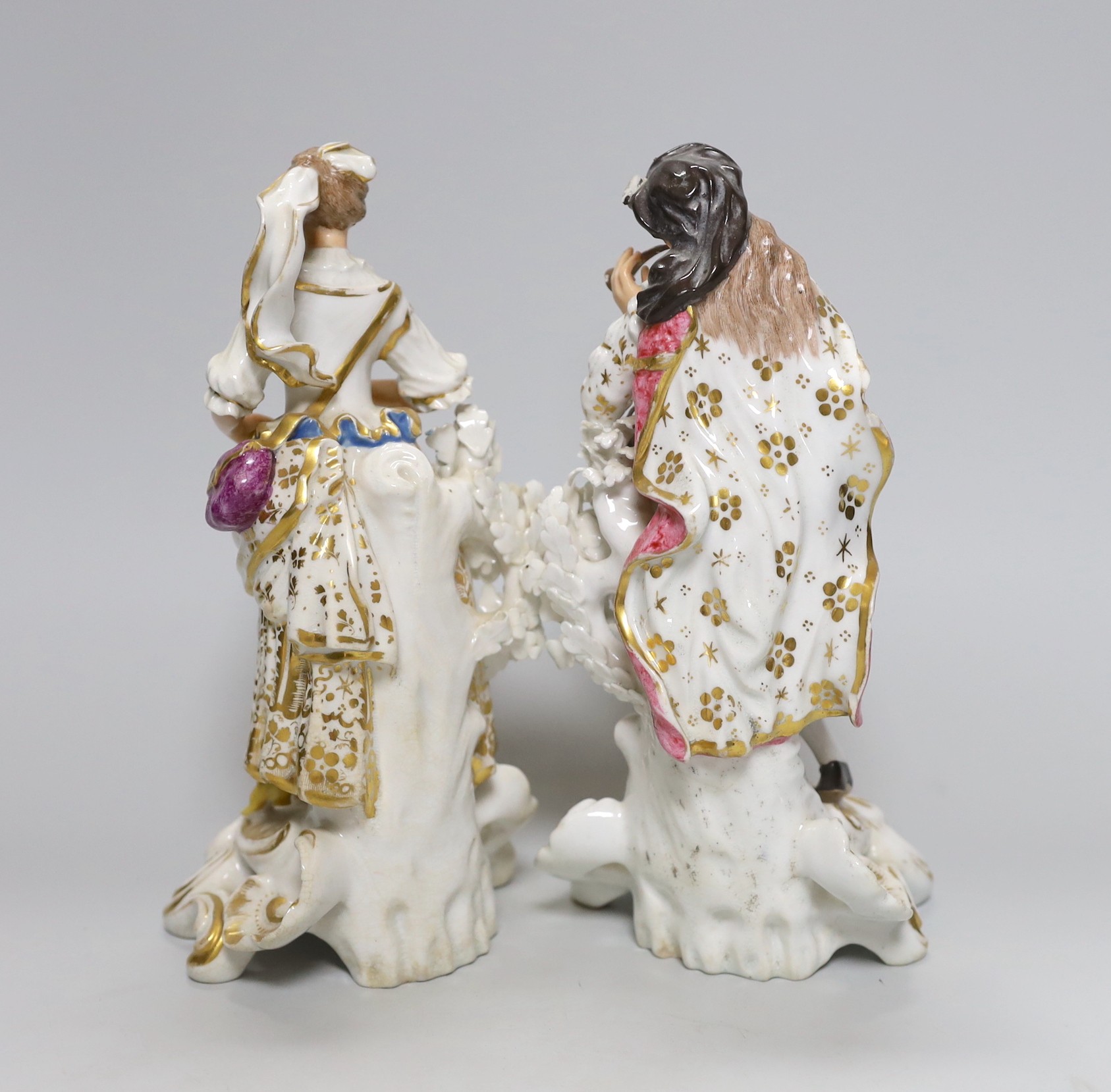 A pair of early 19th century Derby figures, the gentleman with flute and drum, 21cm